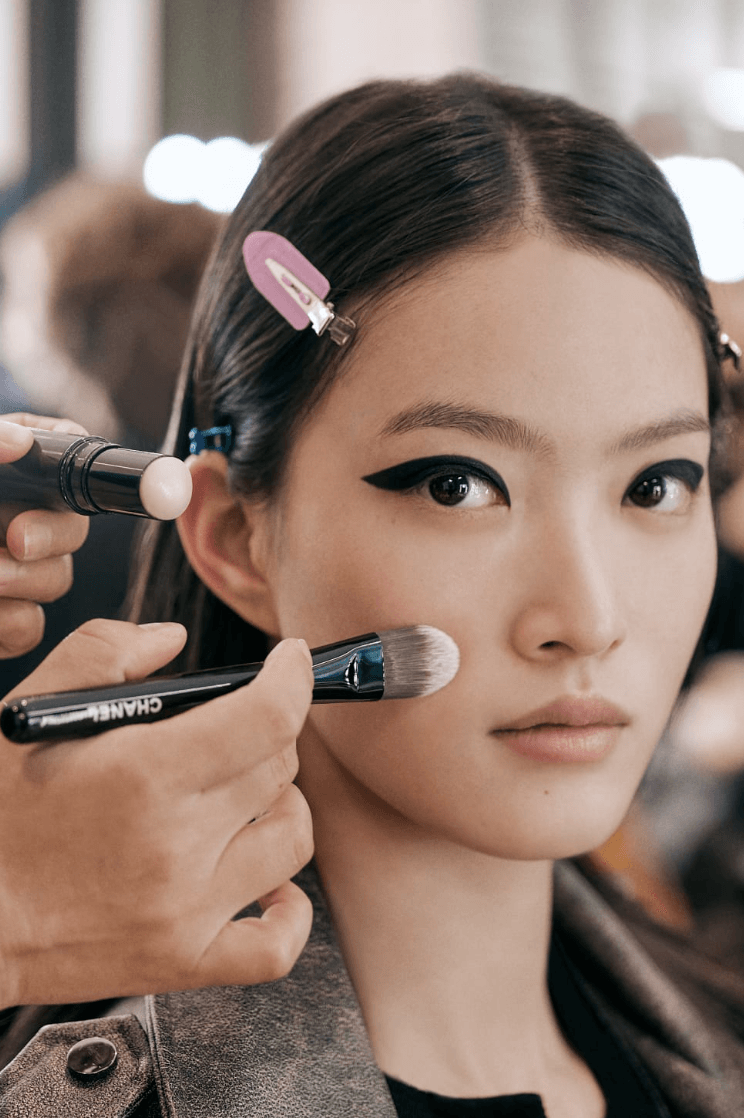 two women with black eyeliner makeup, chanel beauty, fashion