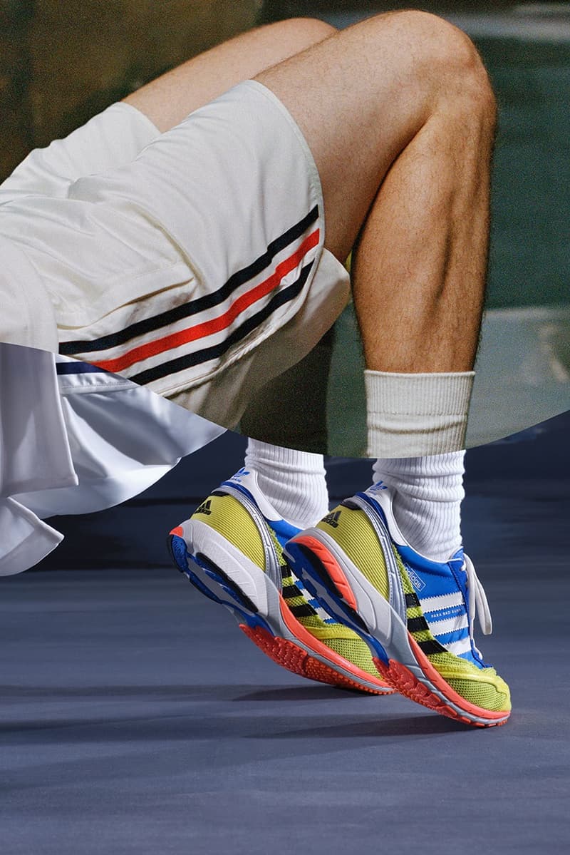 bad bunny adidas adizero sl72 sneaker burgundy red blue yellow white woman moving bike bicycle