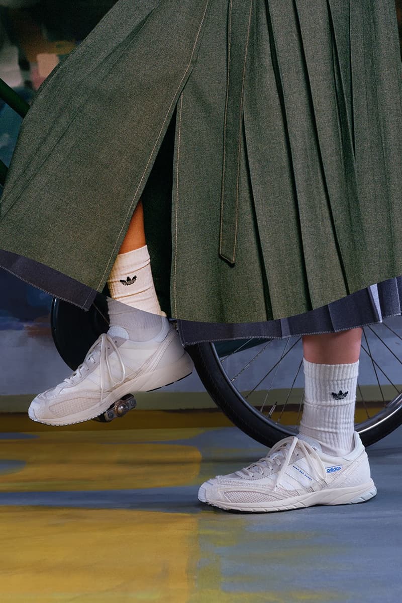 bad bunny adidas adizero sl72 sneaker burgundy red blue yellow white woman moving bike bicycle