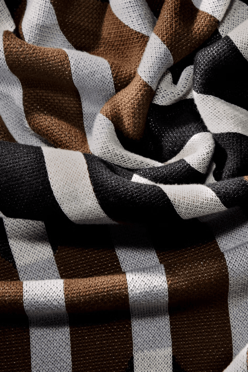 woman wrapped up in blanket, brown throw, homeware, fragrance, perfume, cotton incorporated, d.s. & durga