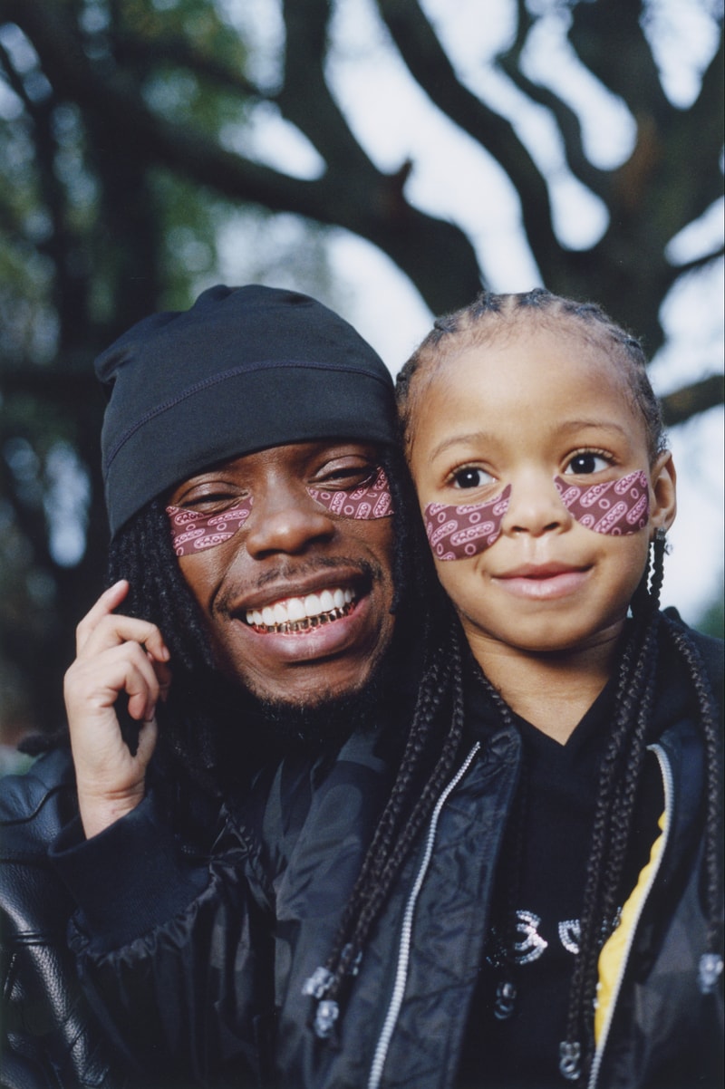 woman with braids wearing topicals "cognac" undereye mask, skincare, beauty