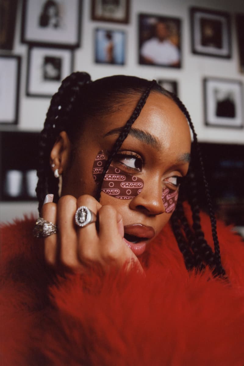 woman with braids wearing topicals "cognac" undereye mask, skincare, beauty