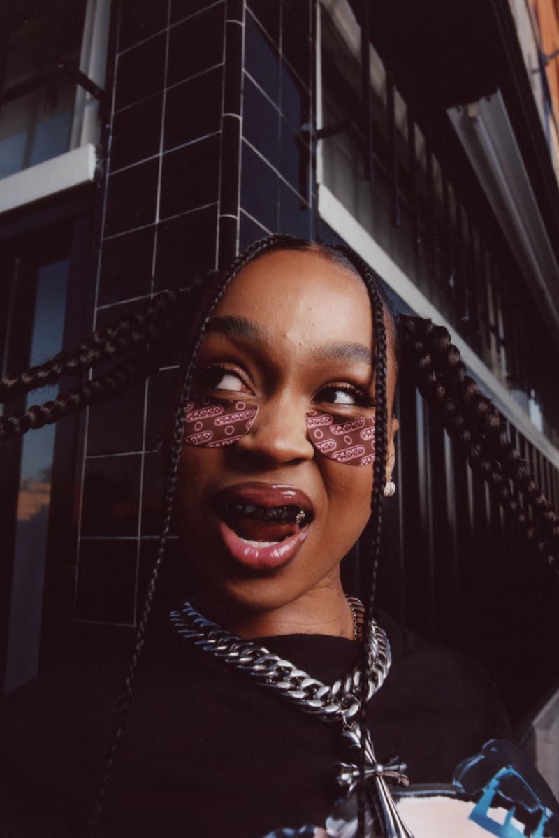 woman with braids wearing topicals "cognac" undereye mask, skincare, beauty