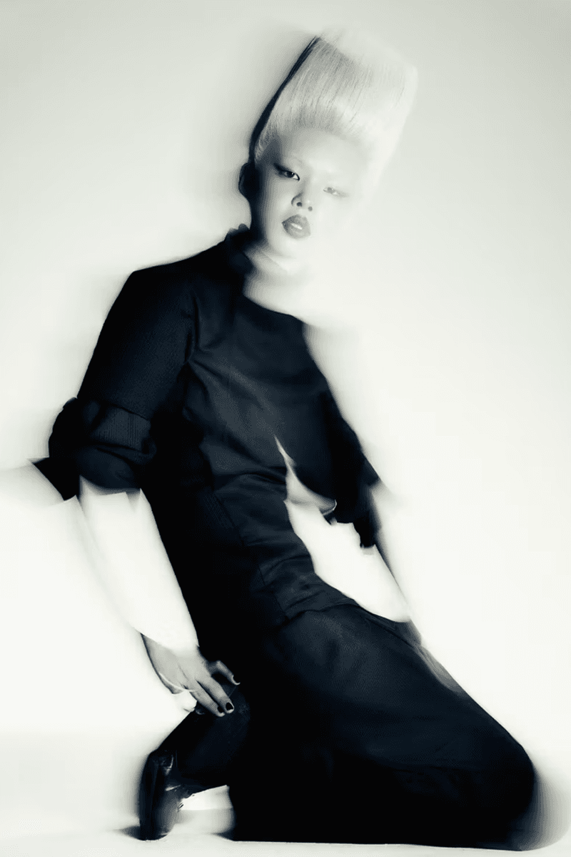 ader error campaign futuristic hair makeup red lip black eyeliner blonde