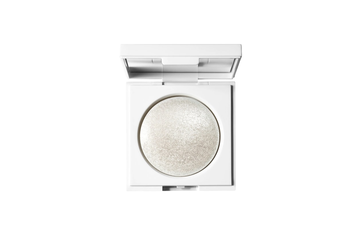 women smiling with glitter on her eyes, new year's eve makeup, glitter, ganni runway show, beauty