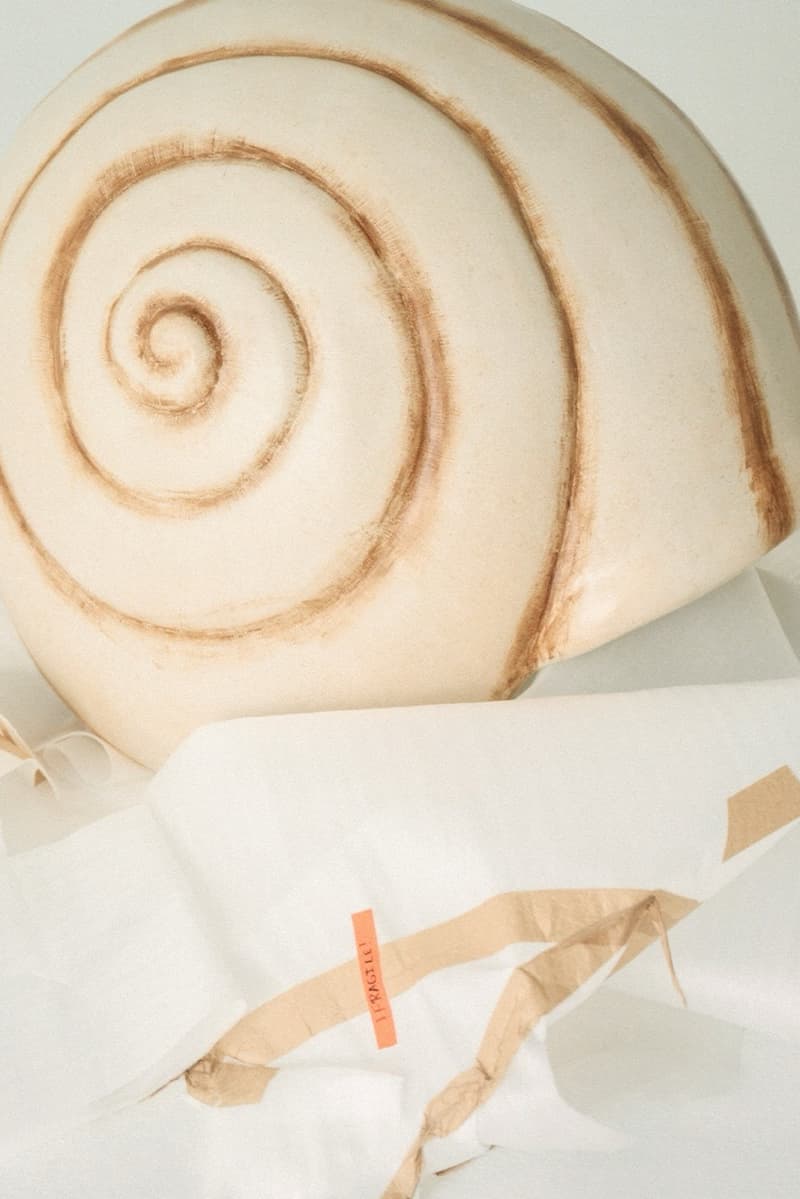 axel arigato snail shell girls boys sculptures 