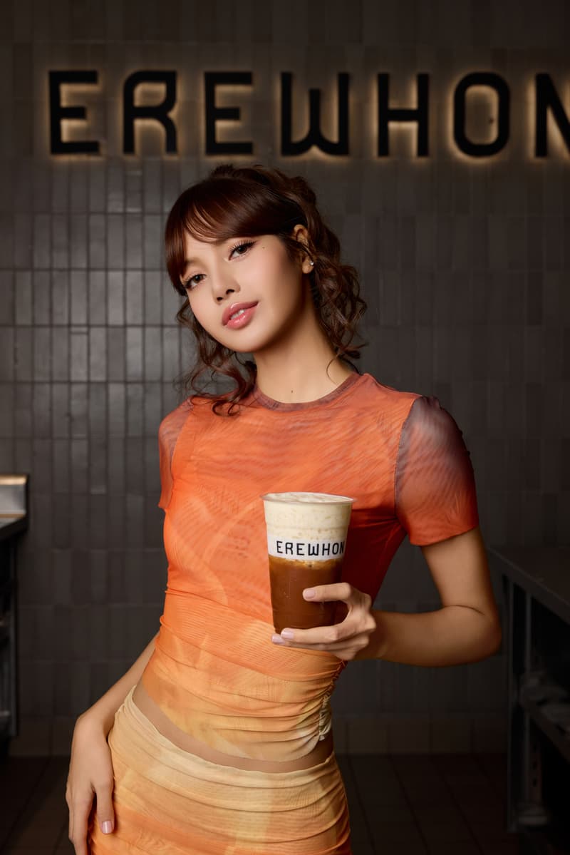 lisa blackpink posing with thai up the world drink, thai iced tea, erewhon smoothie, healthy beverage, wellness, k-pop