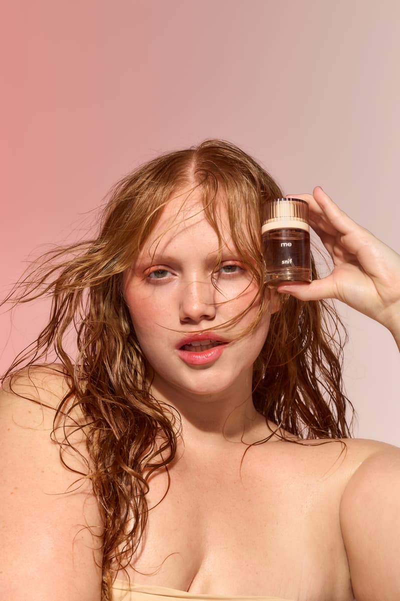 five people holding peaches, posing closely together, "me" fragrance, snif, perfume, beauty