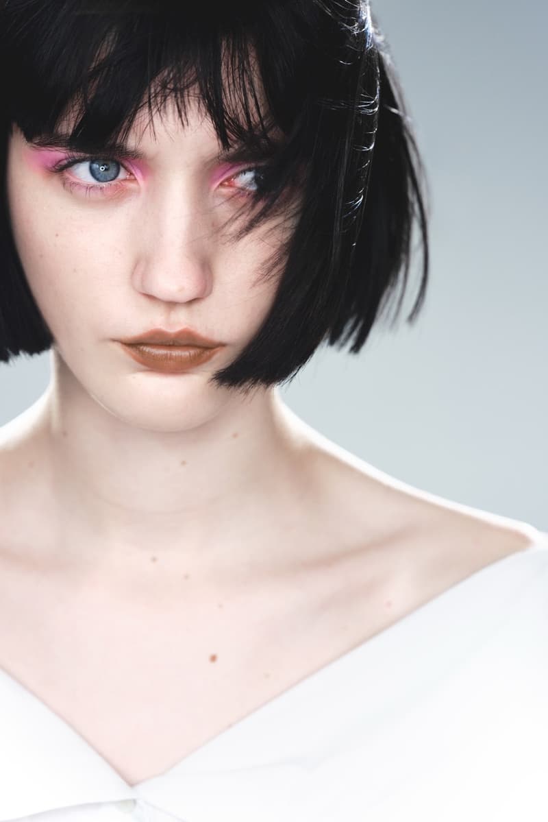 weekday limited edition collection woman girl lying down rug carpet black glossy