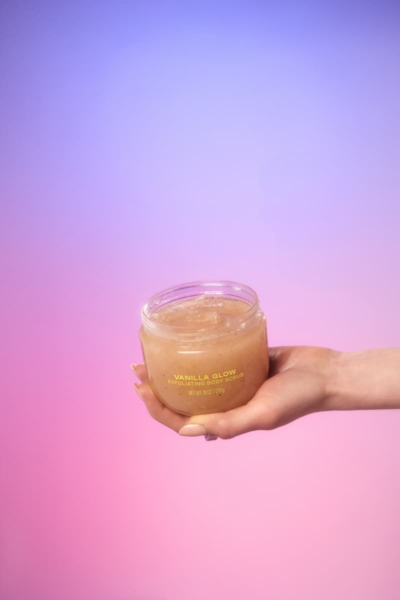 three women with colorful eyeshadow, posing with daise perfume bottles, fragrance, mood boosters, beauty