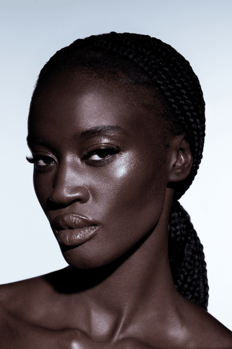 woman surrounded by flowers laying down, od beauty, makeup brand, ossiel ramos, diego díez