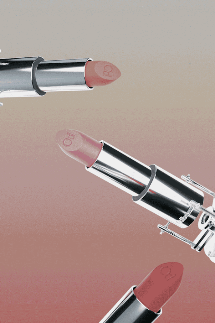 woman surrounded by flowers laying down, od beauty, makeup brand, ossiel ramos, diego díez