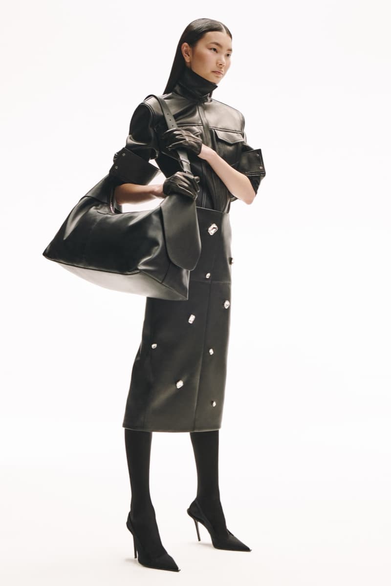 david koma woman girl red background tassels black dress leather pants bra