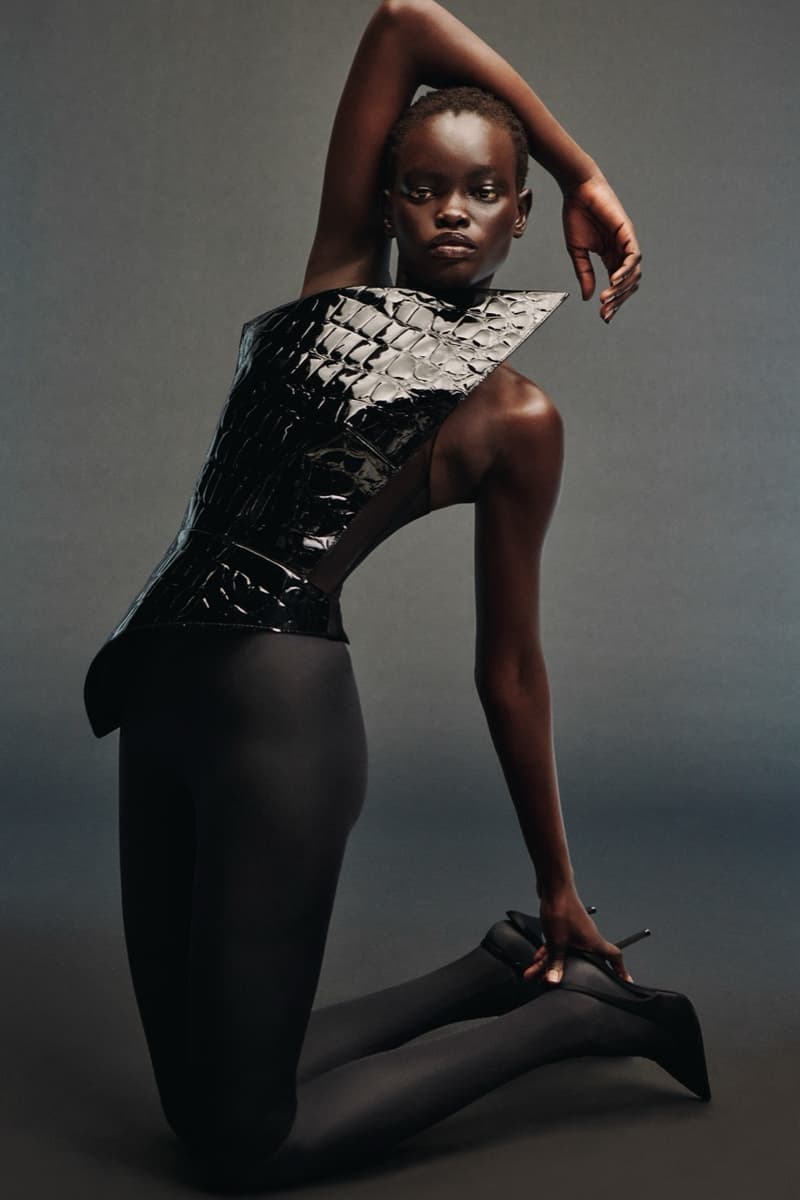 david koma woman girl red background tassels black dress leather pants bra