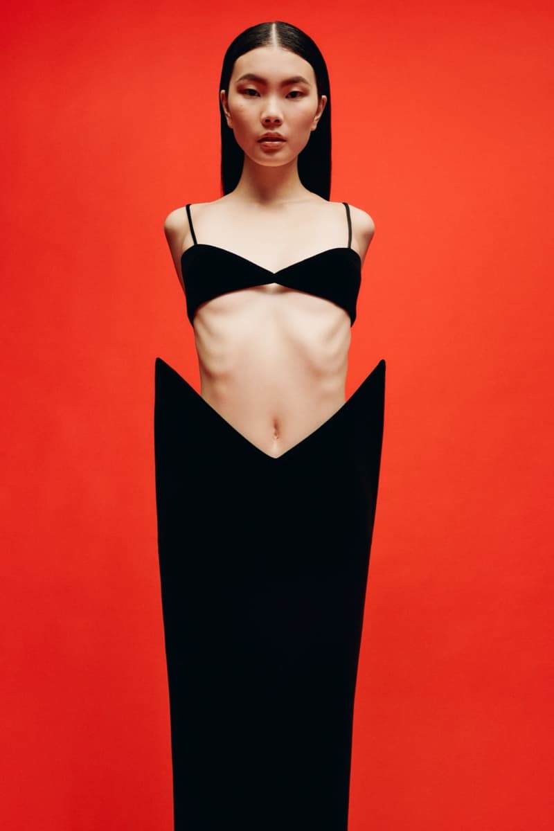 david koma woman girl red background tassels black dress leather pants bra