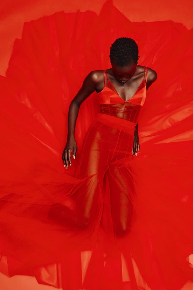 david koma woman girl red background tassels black dress leather pants bra