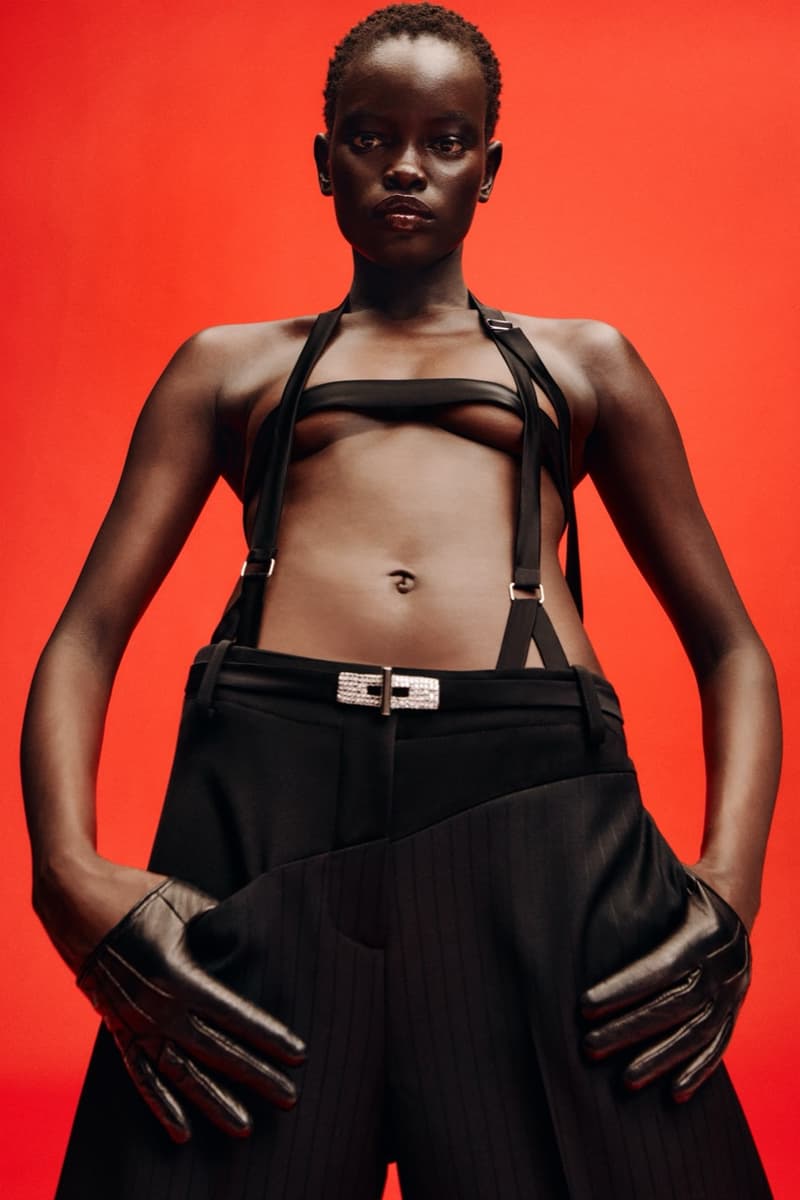 david koma woman girl red background tassels black dress leather pants bra