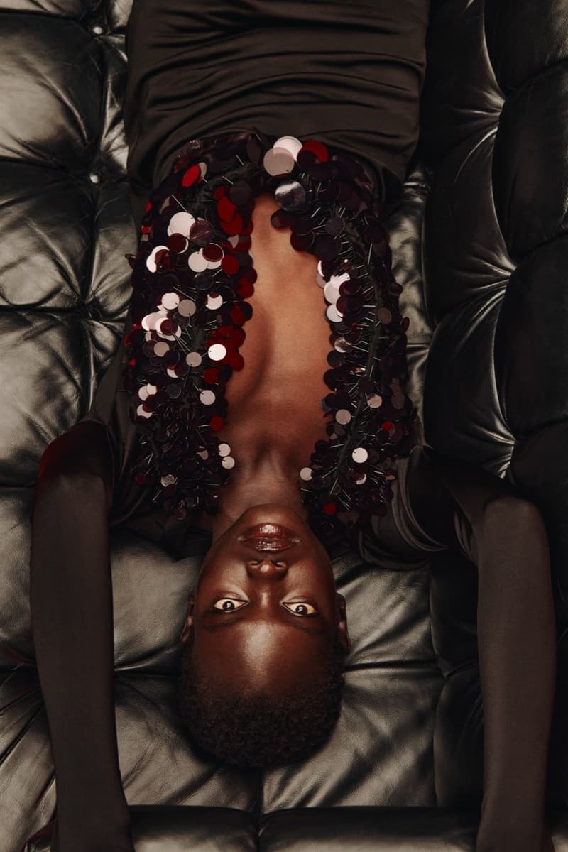 david koma woman girl red background tassels black dress leather pants bra