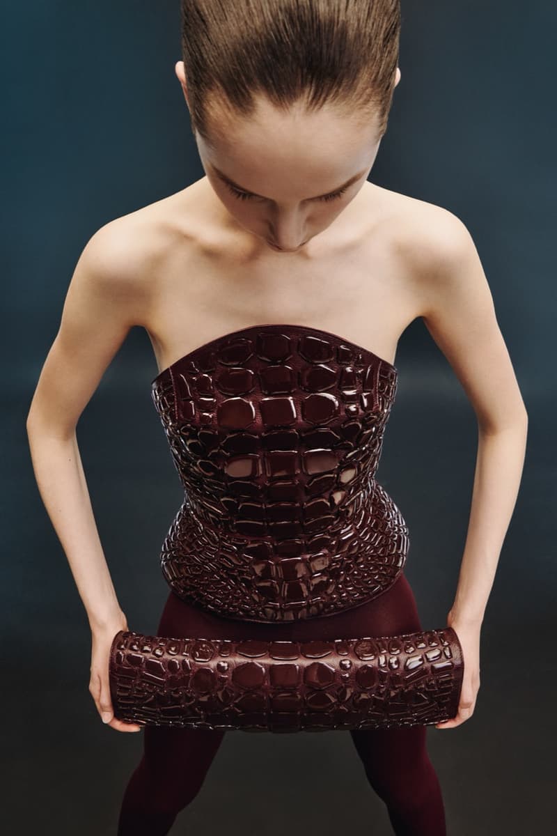 david koma woman girl red background tassels black dress leather pants bra