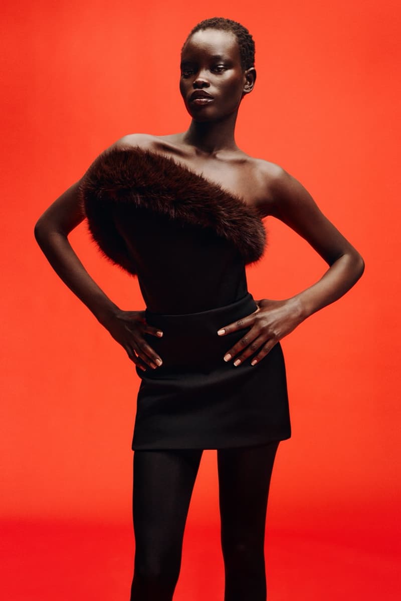 david koma woman girl red background tassels black dress leather pants bra