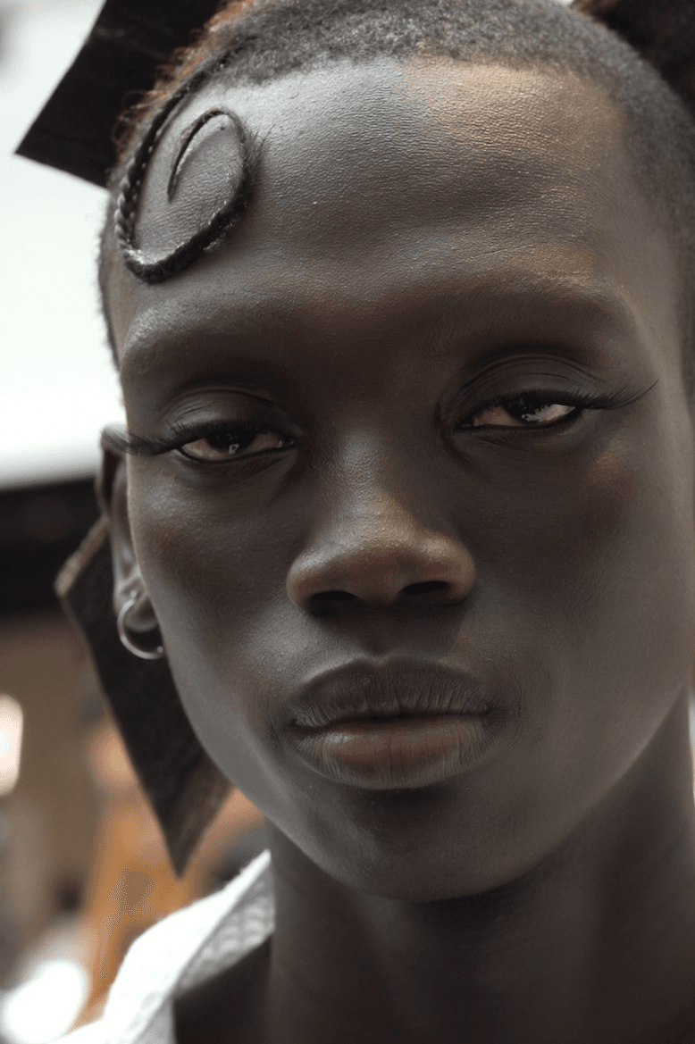 isamaya ffrench applying feather eyelashes, lashify beauty, thom browne, nails, makeup, hair