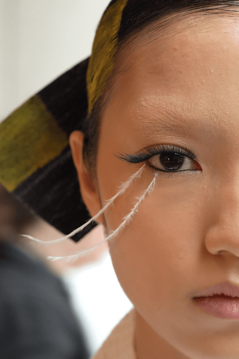 isamaya ffrench applying feather eyelashes, lashify beauty, thom browne, nails, makeup, hair