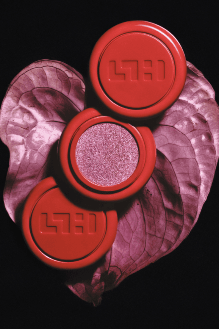 founder of simihaze beauty posing with new color glaze lip and cheek pigment, makeup, beauty