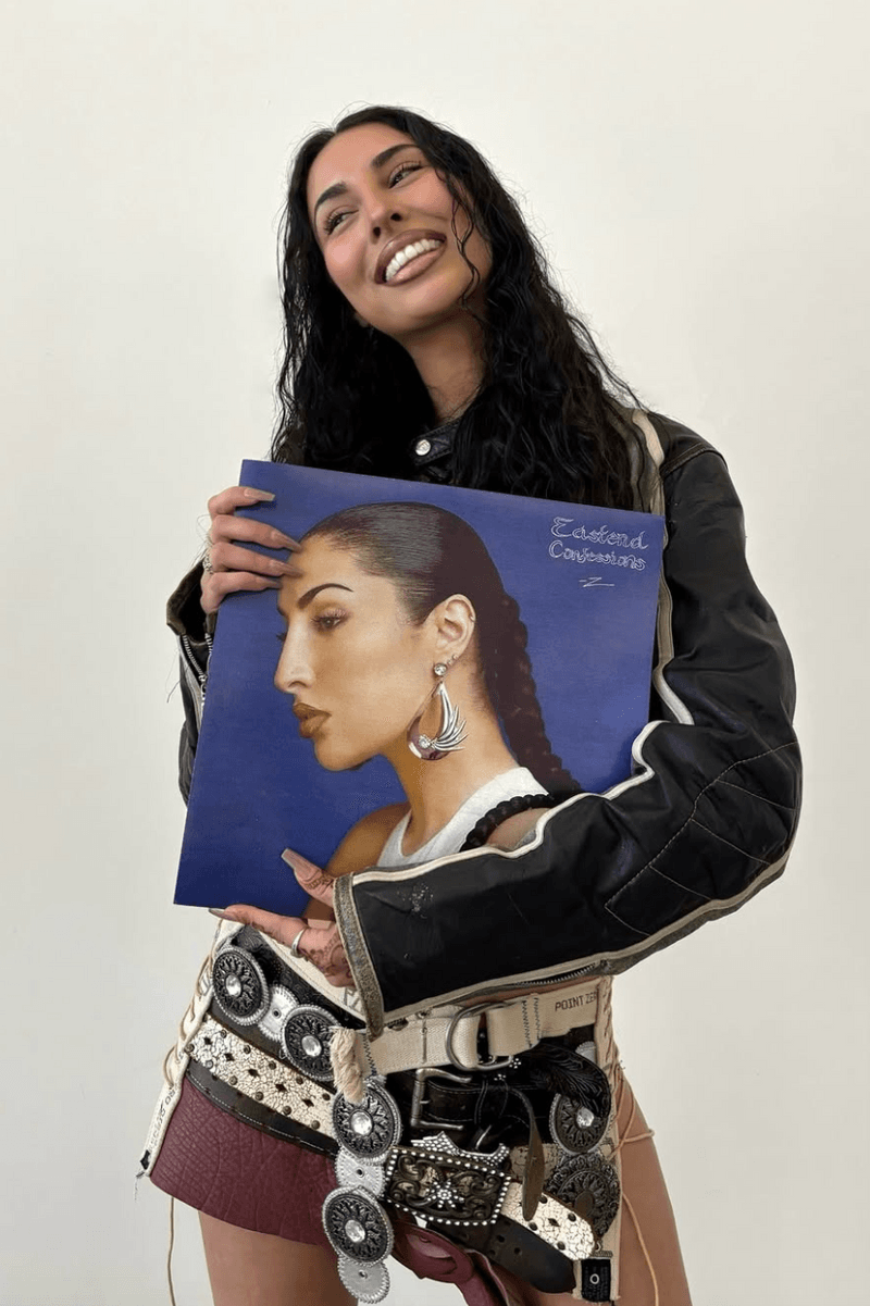 photo of zeina with curly long hair and denim top, arab artist, nyxtape, nyx cosmetics, makeup, beauty