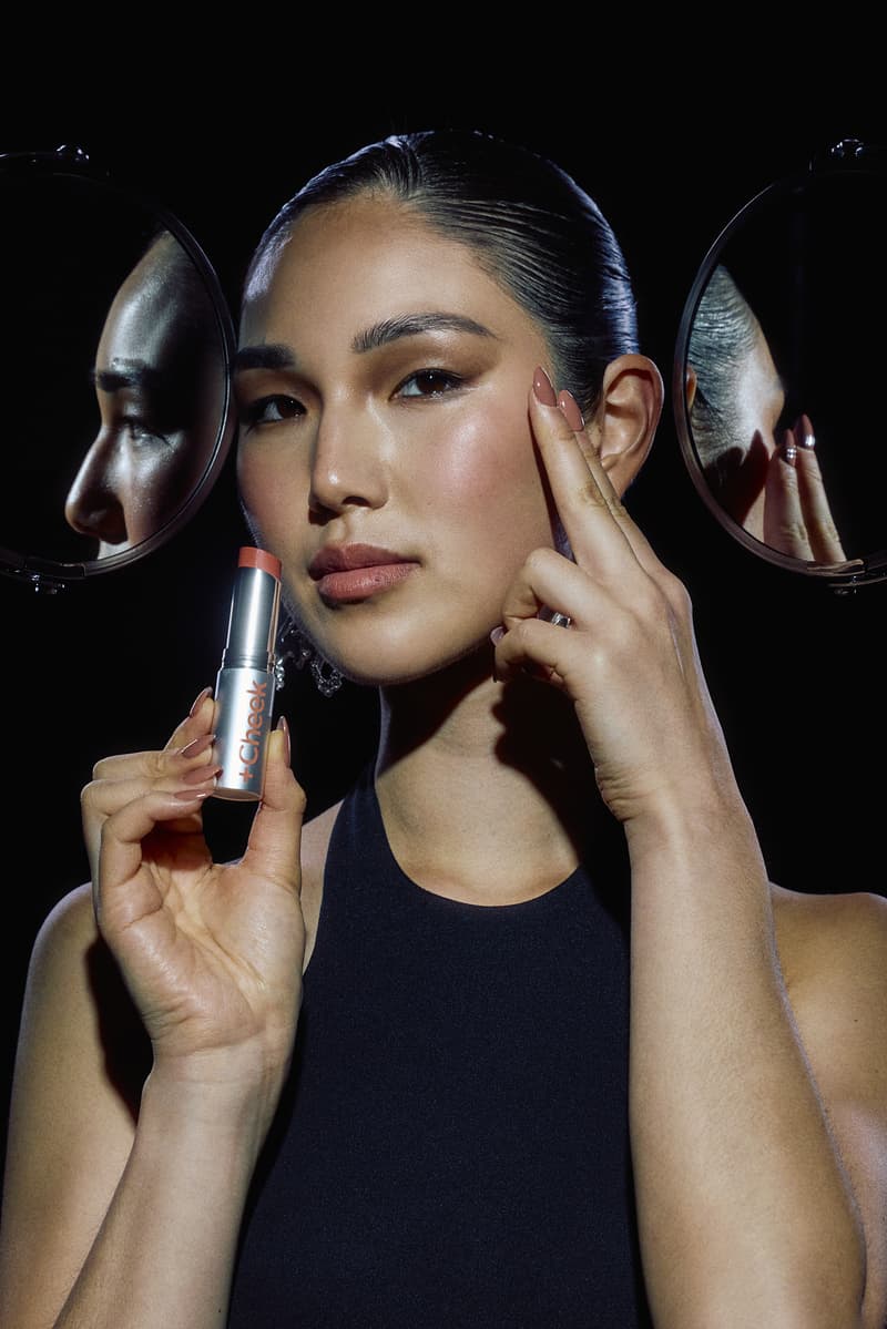 woman applying pleasing lip and cheek tint with mirrors, makeup, beauty, harry styles