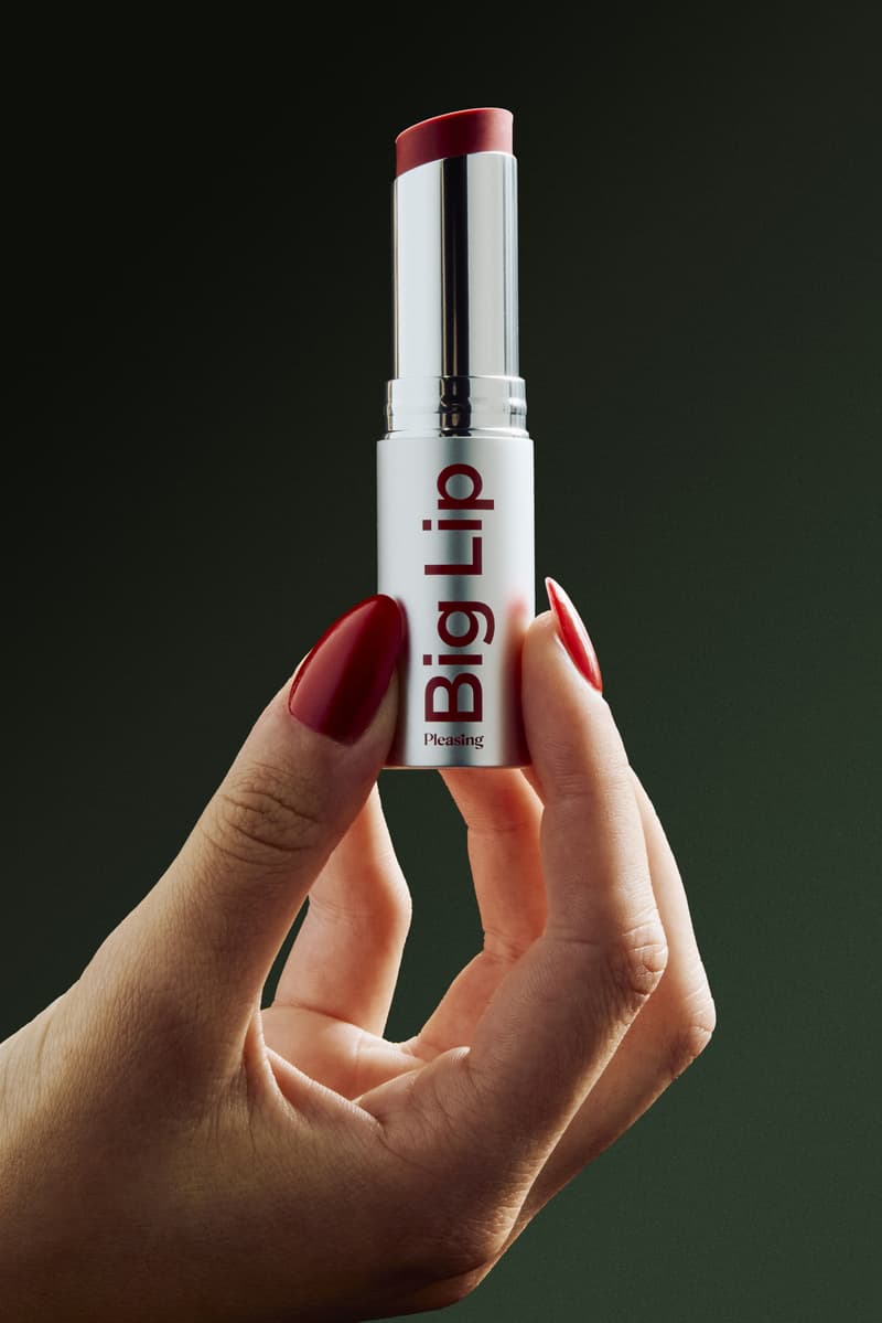 woman applying pleasing lip and cheek tint with mirrors, makeup, beauty, harry styles