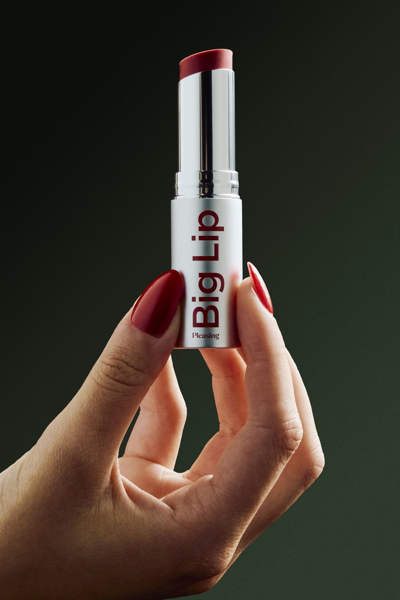 woman applying pleasing lip and cheek tint with mirrors, makeup, beauty, harry styles