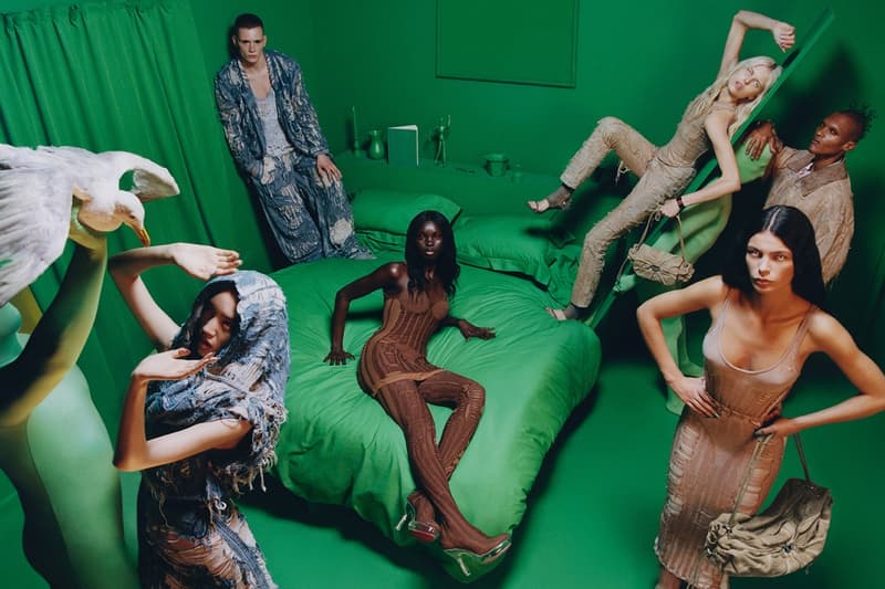 diesel campaign woman silver bikini boobs black handbag 