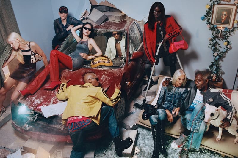 diesel campaign woman silver bikini boobs black handbag 