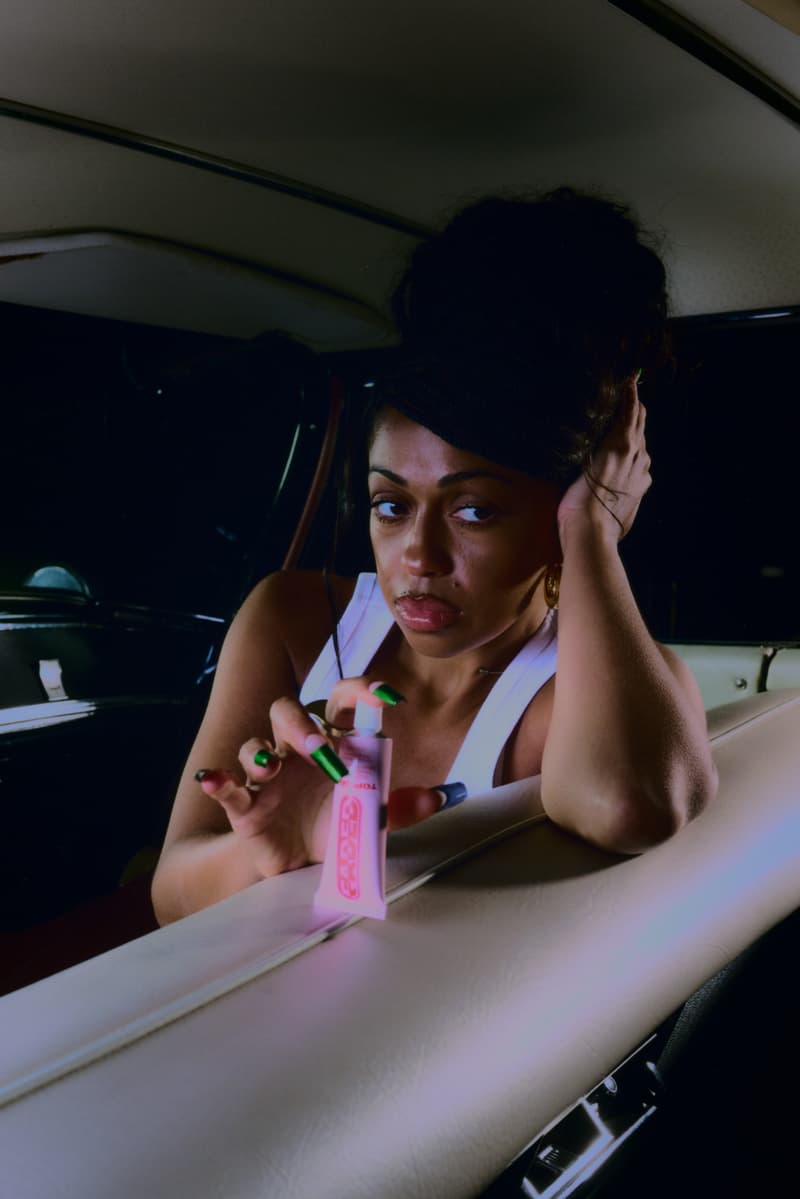 women driving in a car with a topicals serum, campaign skincare relaunch, beauty