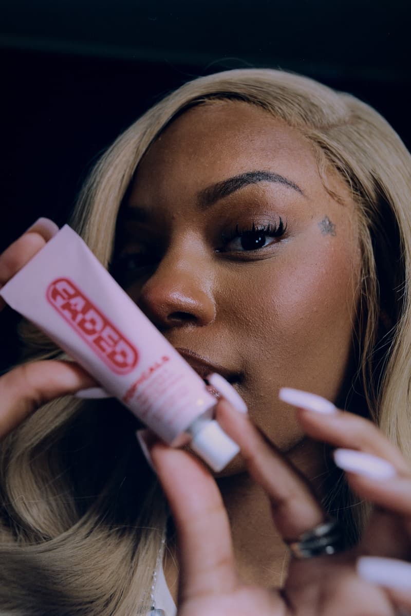 women driving in a car with a topicals serum, campaign skincare relaunch, beauty