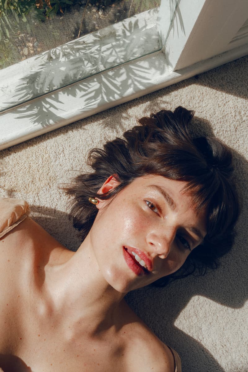 woman relaxing in blow up pool with new good weather skin sunscreen, luxury sun care, skincare, beauty