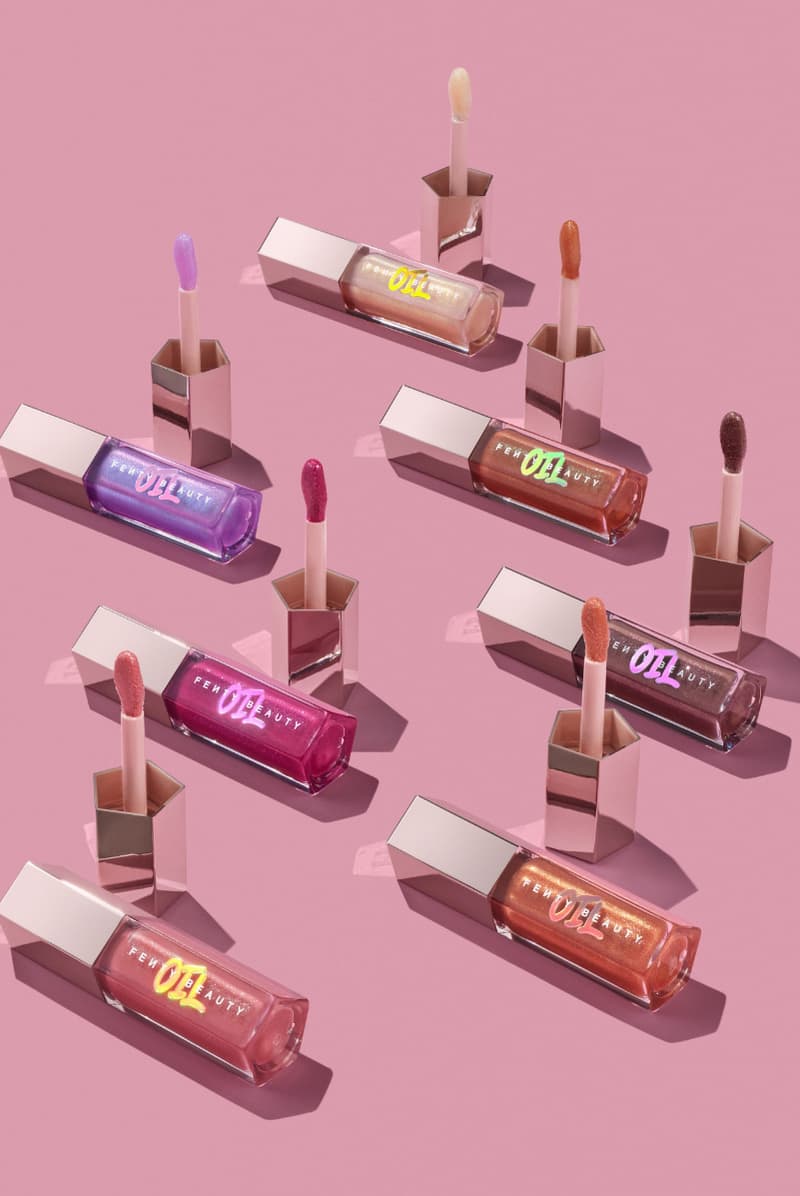 rihanna applying the new fenty beauty gloss bomb oil luminizing' lip oil N' gloss, makeup, lipstick