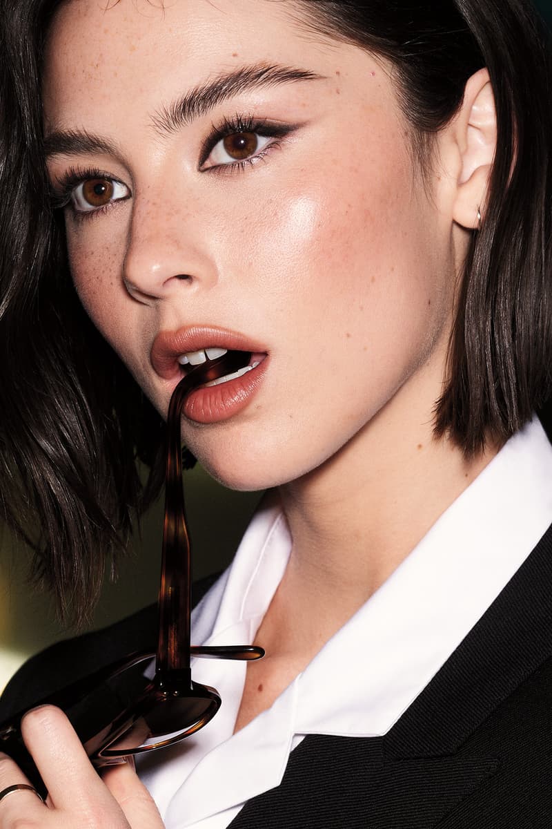 gracie abrams posing with glasses in her mouth, new hourglass makeup ambassador, beauty