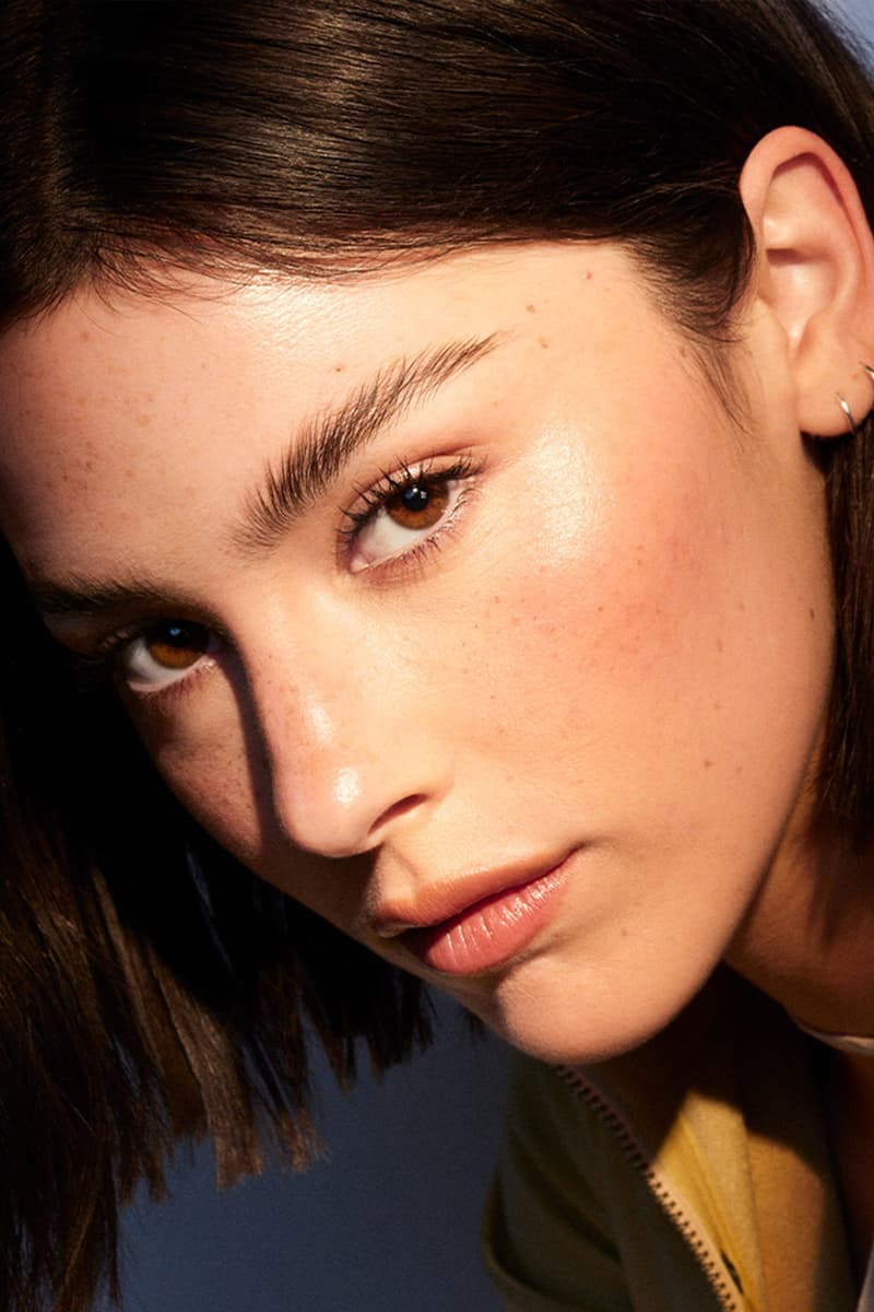 gracie abrams posing with glasses in her mouth, new hourglass makeup ambassador, beauty