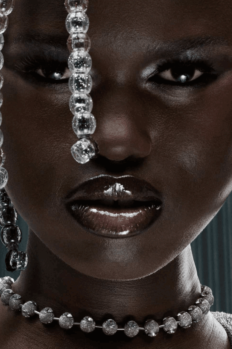 woman with mac cosmetics eyeshadow and lipstick on, new lipglass air gloss and blow plumping lip oil, makeup, beauty