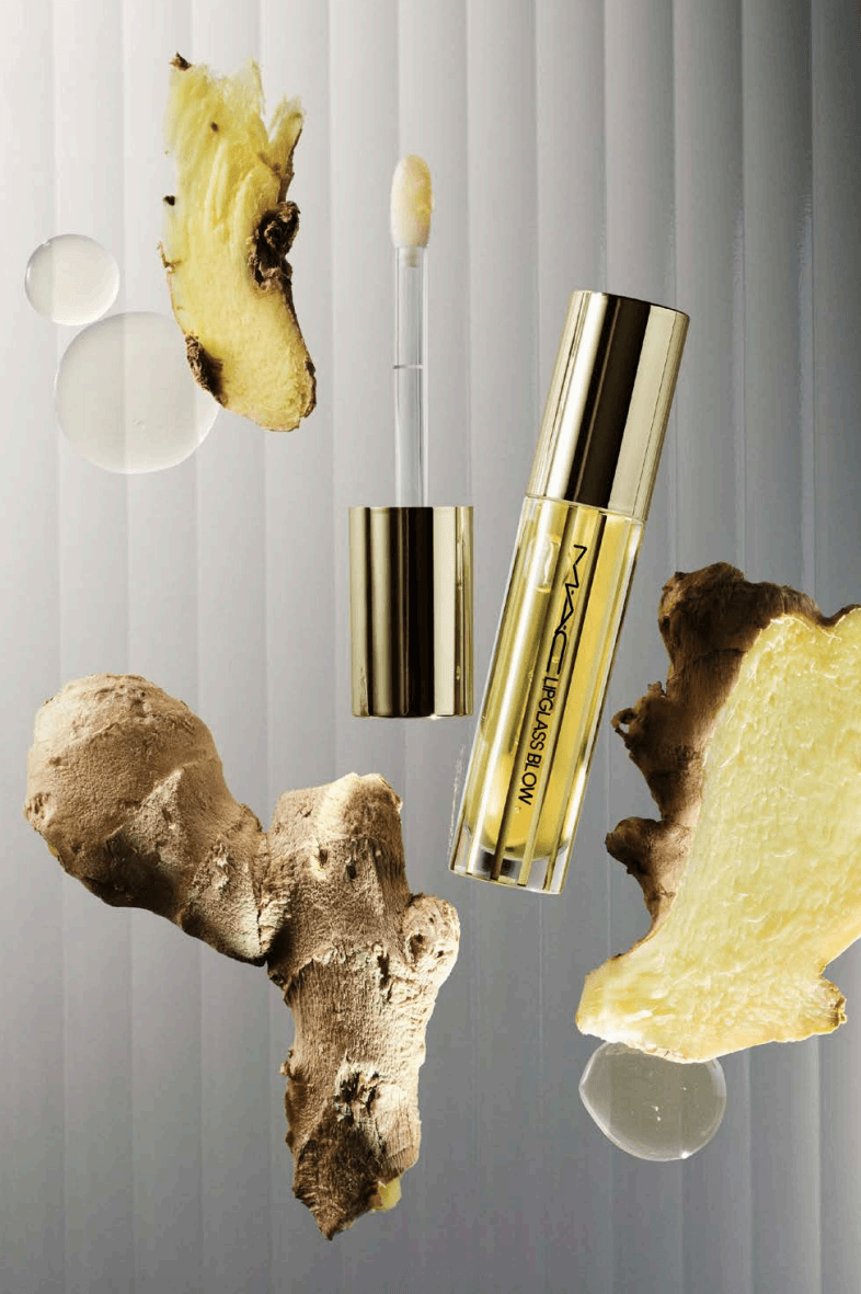 woman with mac cosmetics eyeshadow and lipstick on, new lipglass air gloss and blow plumping lip oil, makeup, beauty