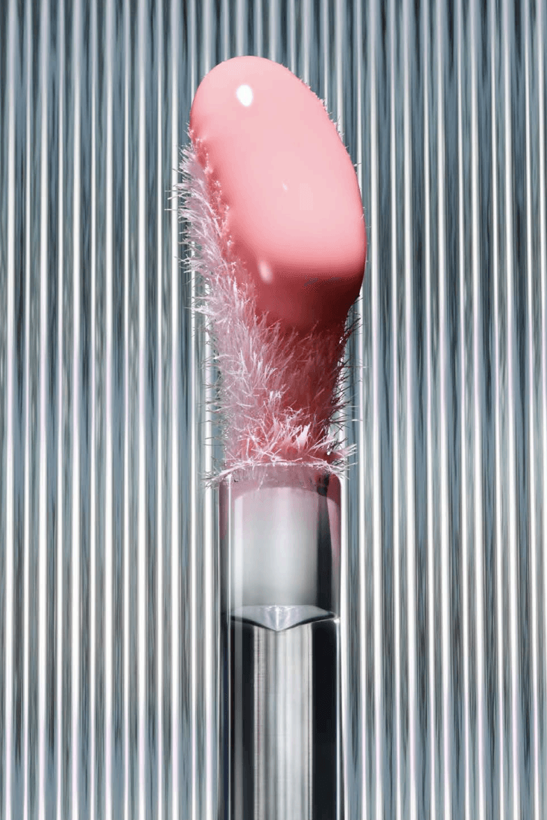 woman with mac cosmetics eyeshadow and lipstick on, new lipglass air gloss and blow plumping lip oil, makeup, beauty