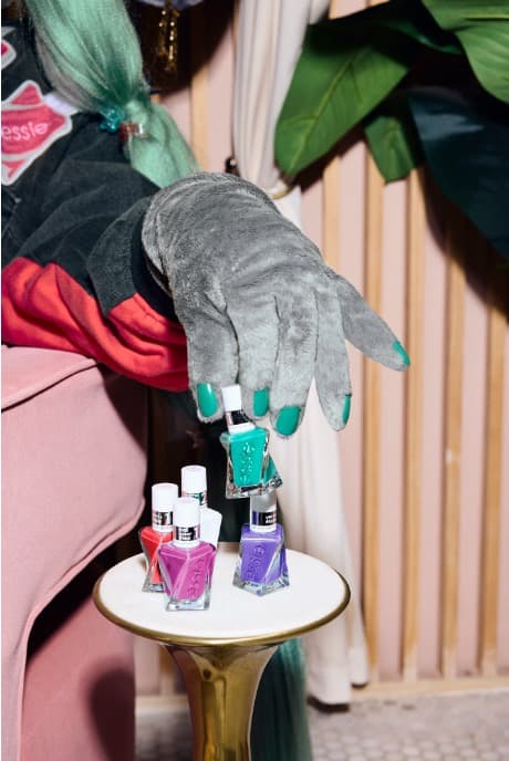 ellie the elephant mascot first-ever celebrity brand ambassador of essie nail polish posing outside of the barclays center, sports, nail care, nails