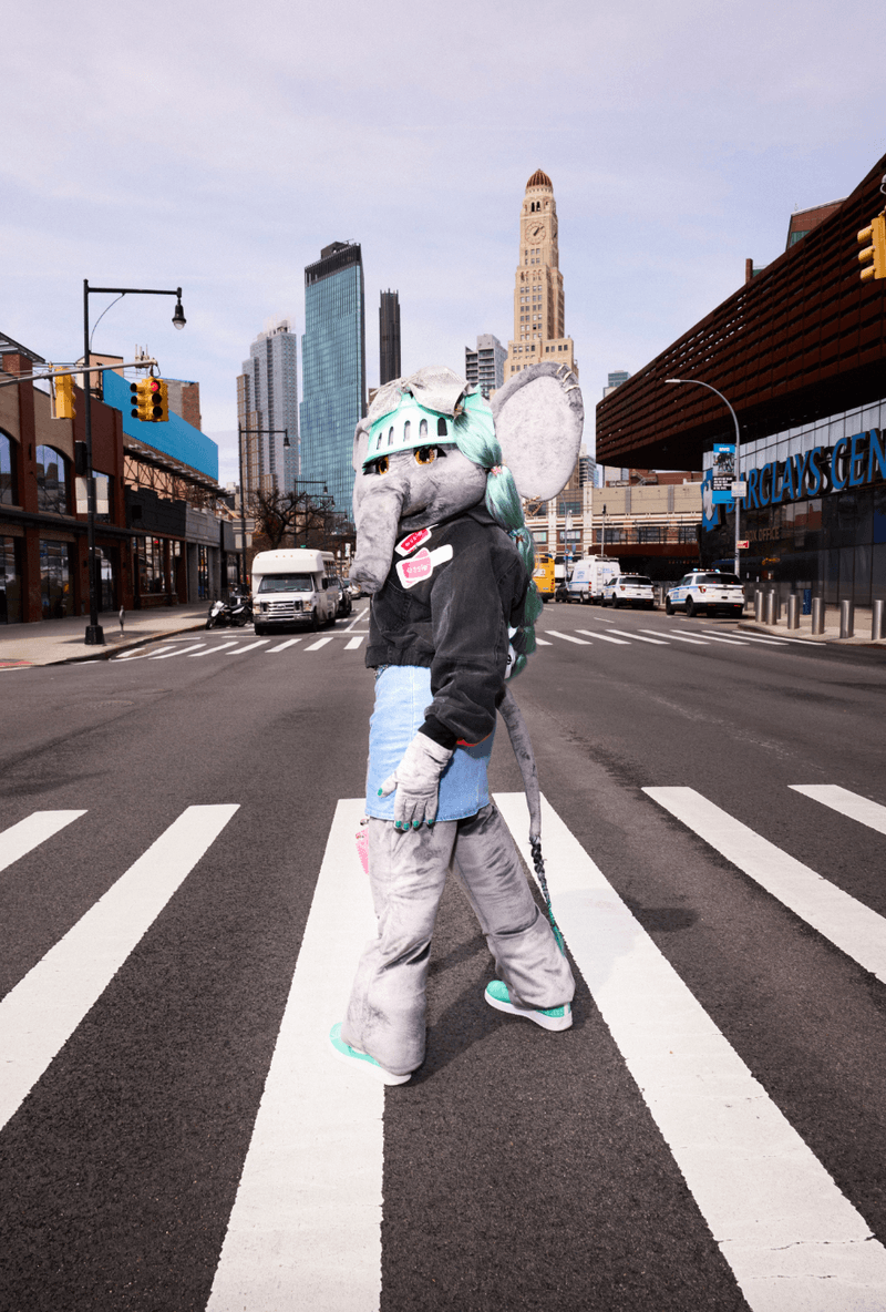 ellie the elephant mascot first-ever celebrity brand ambassador of essie nail polish posing outside of the barclays center, sports, nail care, nails