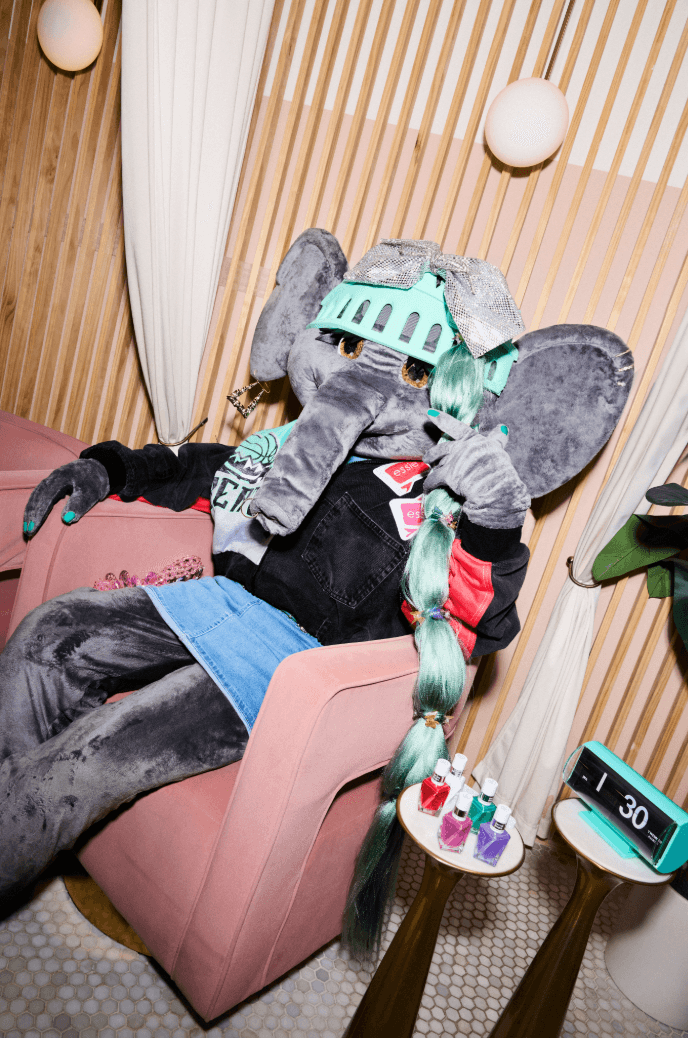 ellie the elephant mascot first-ever celebrity brand ambassador of essie nail polish posing outside of the barclays center, sports, nail care, nails