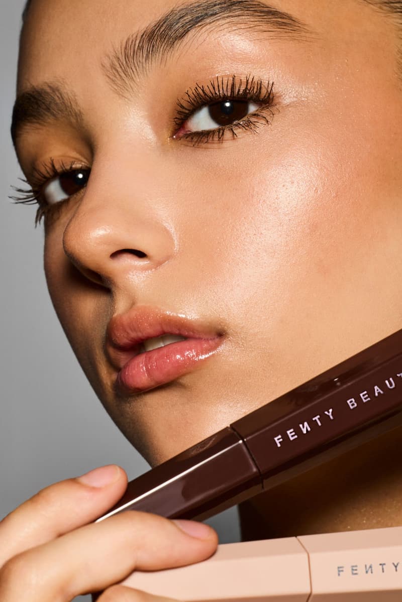 woman posing with new fenty beauty products, makeup, skincare, rihanna