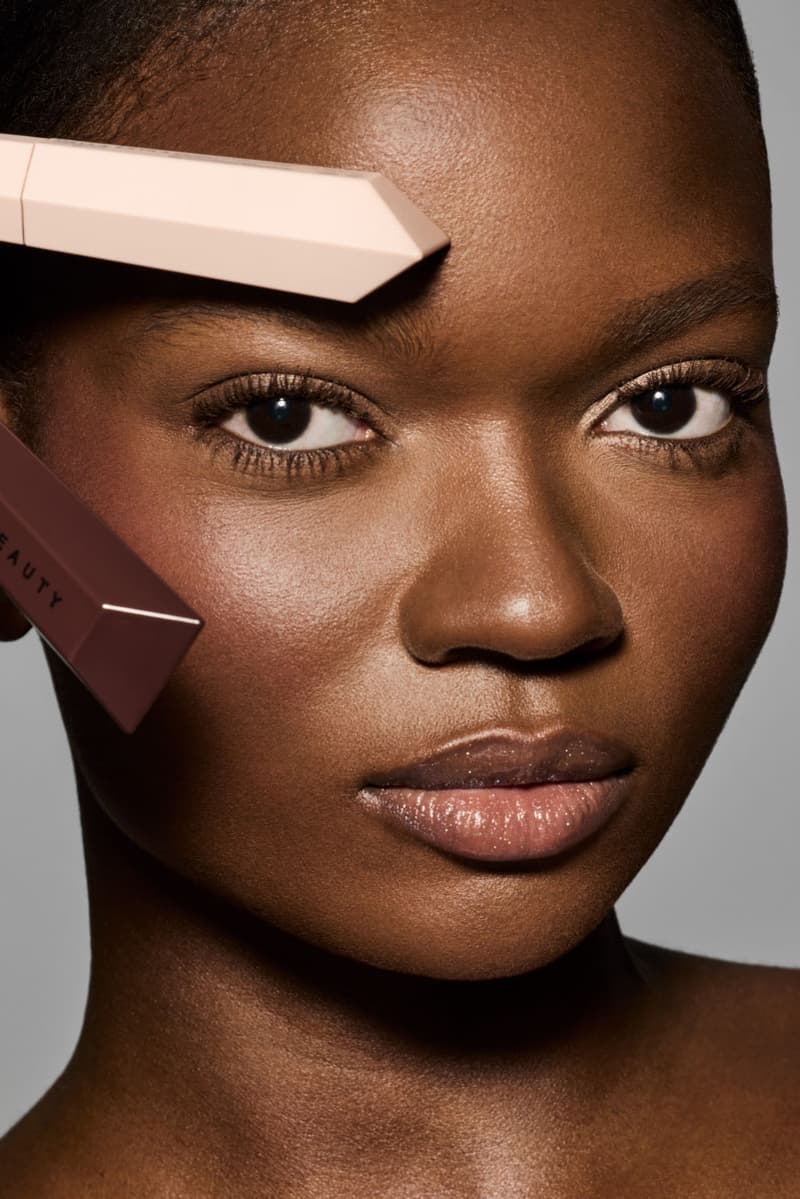 woman posing with new fenty beauty products, makeup, skincare, rihanna