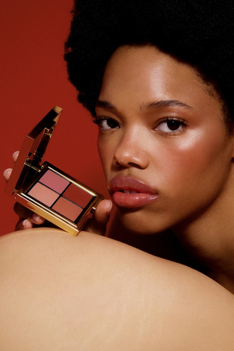 woman laying down next to the new les filles en rouje la charme palette, new makeup, french beauty