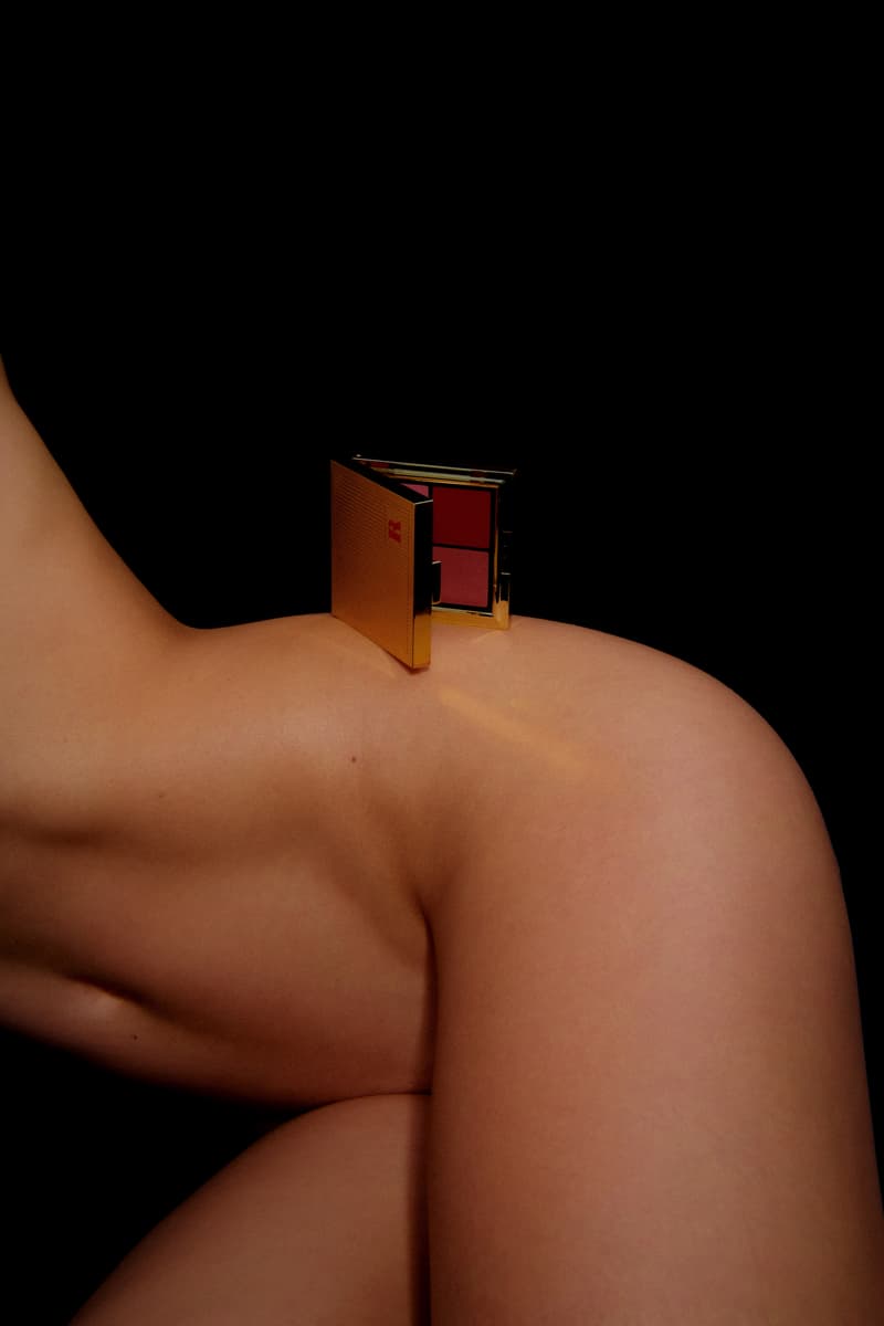 woman laying down next to the new les filles en rouje la charme palette, new makeup, french beauty