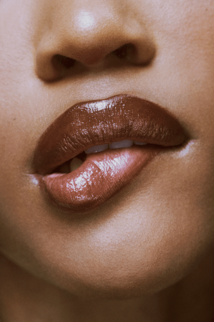 quen blackwell in office wear, glossier balm dot calm mocha espresso, beauty, skincare, makeup